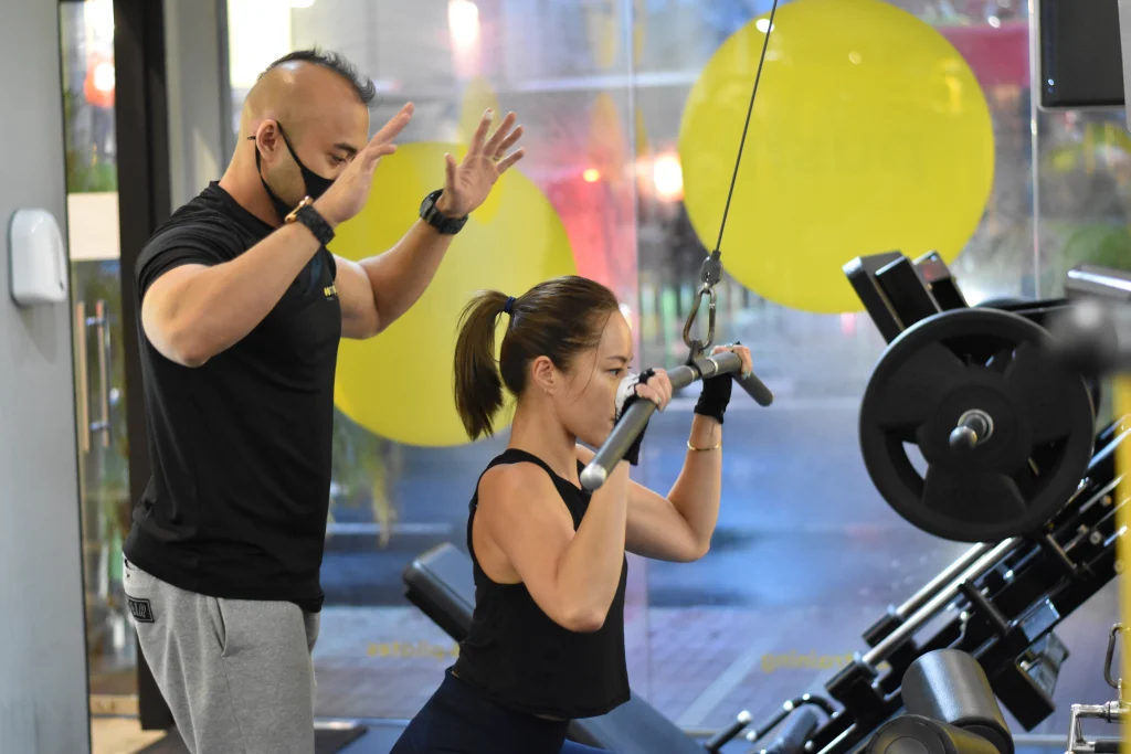 Personal Trainer with his client at Oompf! Fitness